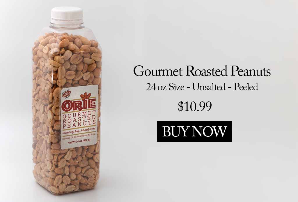 A bottle of roasted peanuts on top of a table.